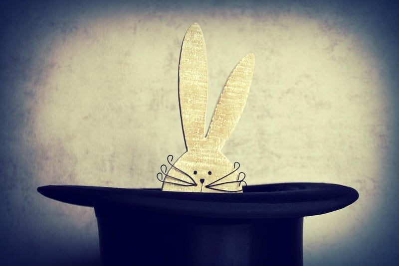 Magician with wand and rabbit